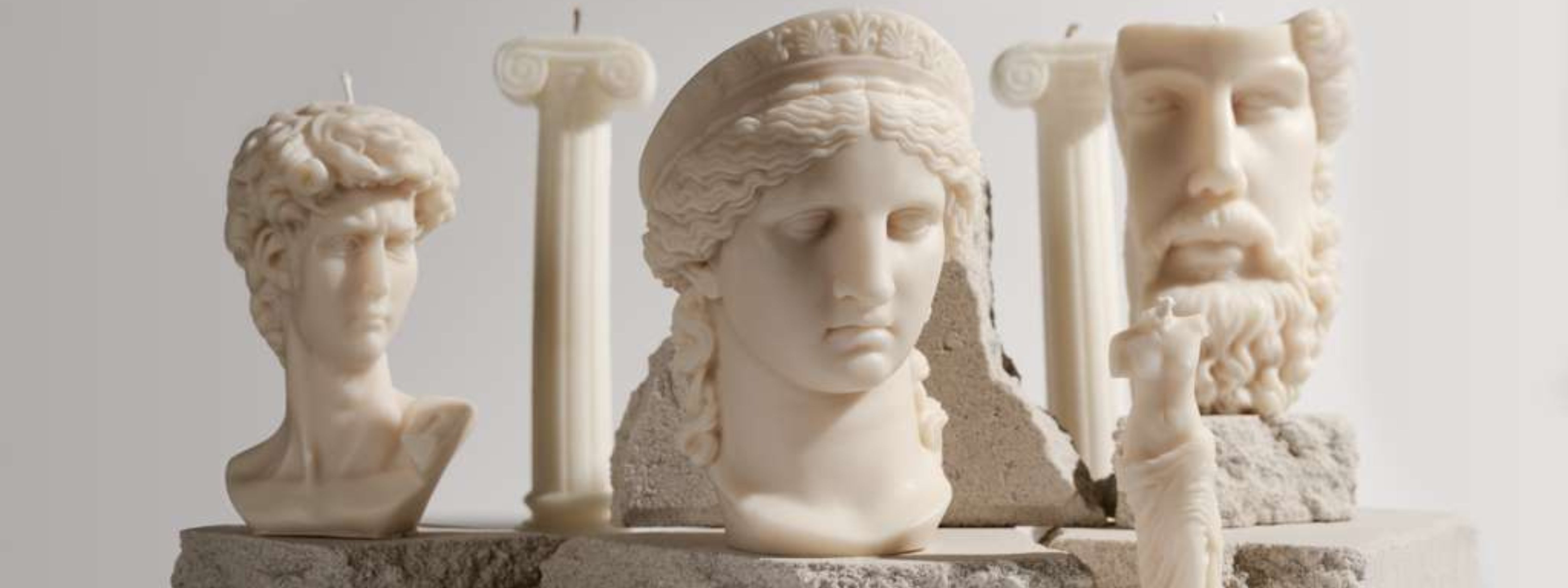 Quiet luxury sculptural candles in neutral tones inspired by Greek statues, elegant minimalist home decor styling