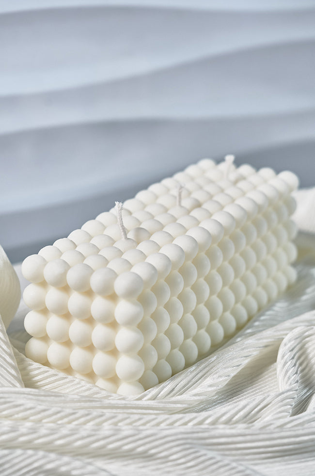 Magnificent Bubble Candle: Handcrafted rectangular bubble candle made of eco-friendly wax, featuring a minimalist sculptural design with soft geometric spheres — perfect for modern luxury home décor.