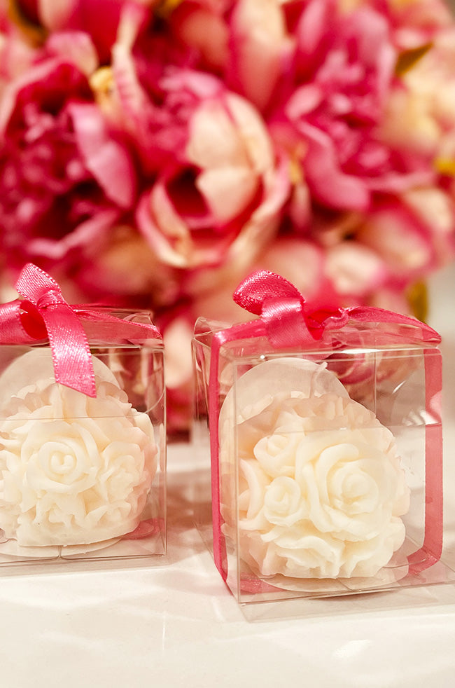 Mini Bloom Gifted Candle: Two Mini Bloom candles packaged as elegant event favors with pink ribbons.