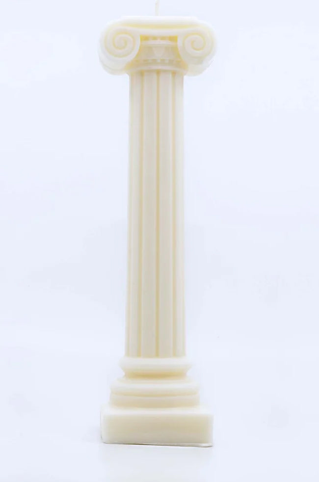 Pillar of Light Candle: Ivory Pillar of Light candle shaped like a classical architectural column, photographed on a clean white background