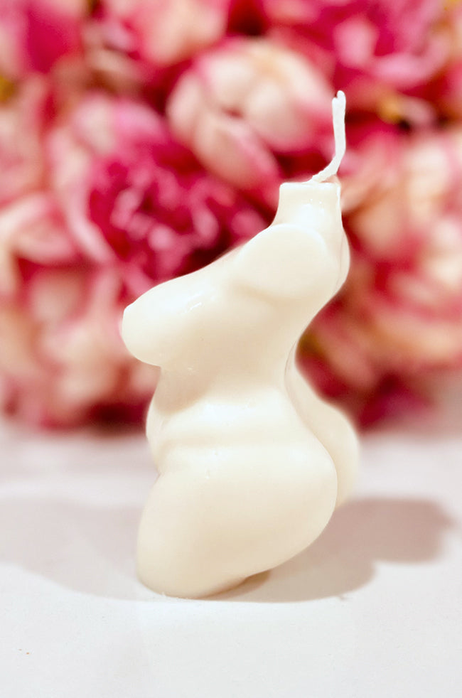 Resilient Warrior Candle: Side profile of the Resilient Warrior body candle showing its sculptural feminine silhouette.