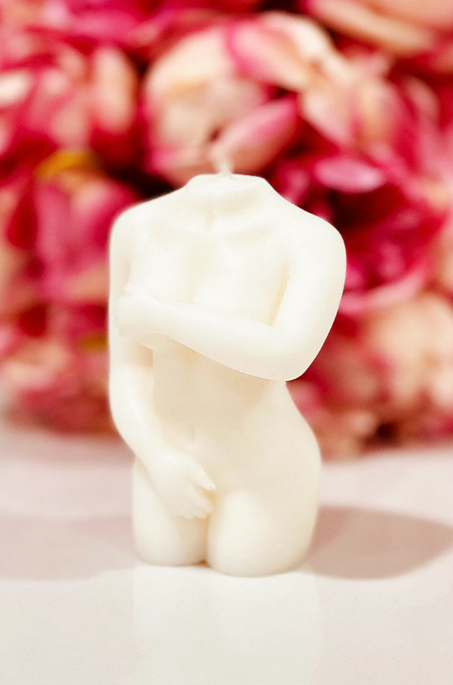 Shy Lady Candle: Shy Lady feminine body candle shown against a clean white background, highlighting its sculptural curves and modest pose.