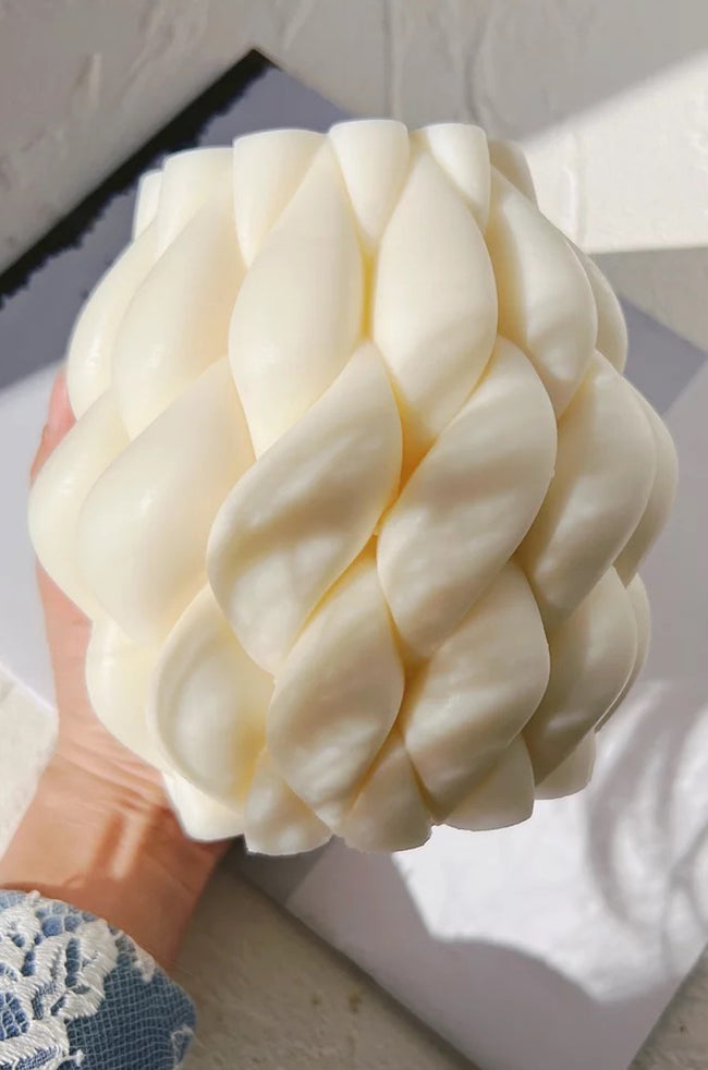 Intertwining Fire Candle: Large handmade intertwining sculptural candle with braided teardrop design, ideal for minimalist and luxury home décor.