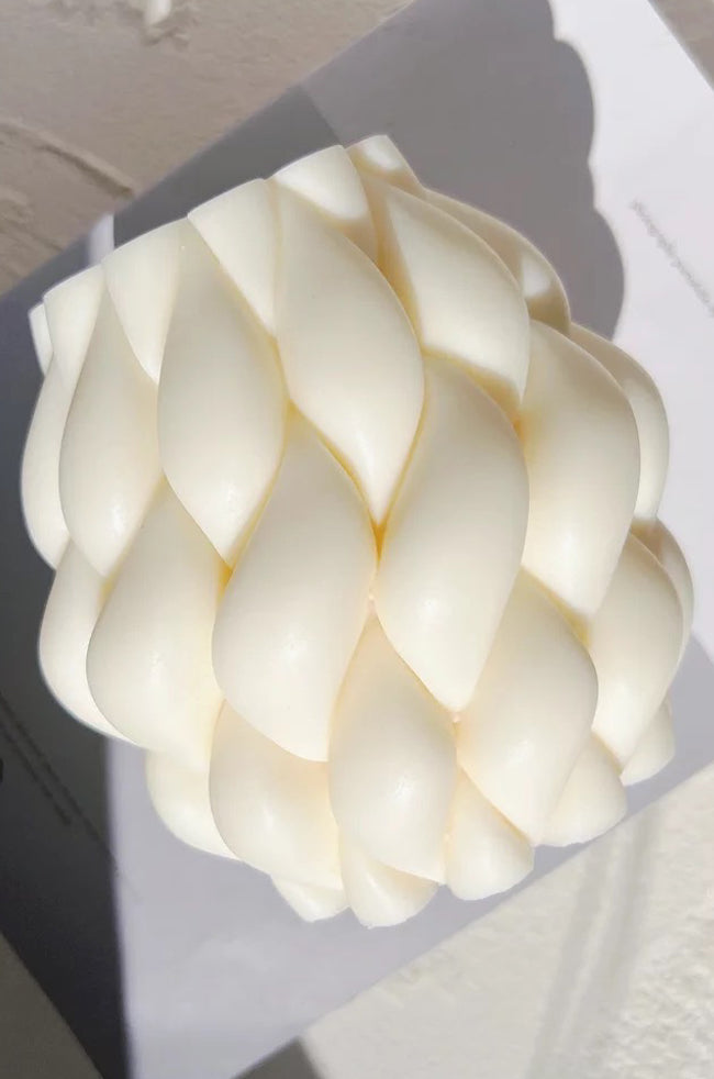 Intertwining Fire Candle: Large handmade intertwining sculptural candle with braided teardrop design, ideal for minimalist and luxury home décor.