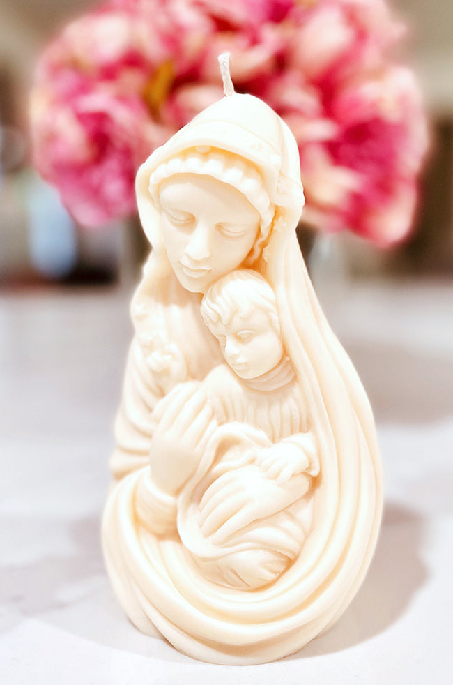 Madonna's Love Candle: Elegant soy wax candle inspired by the Madonna and Child, a sculptural piece celebrating motherhood and devotion.