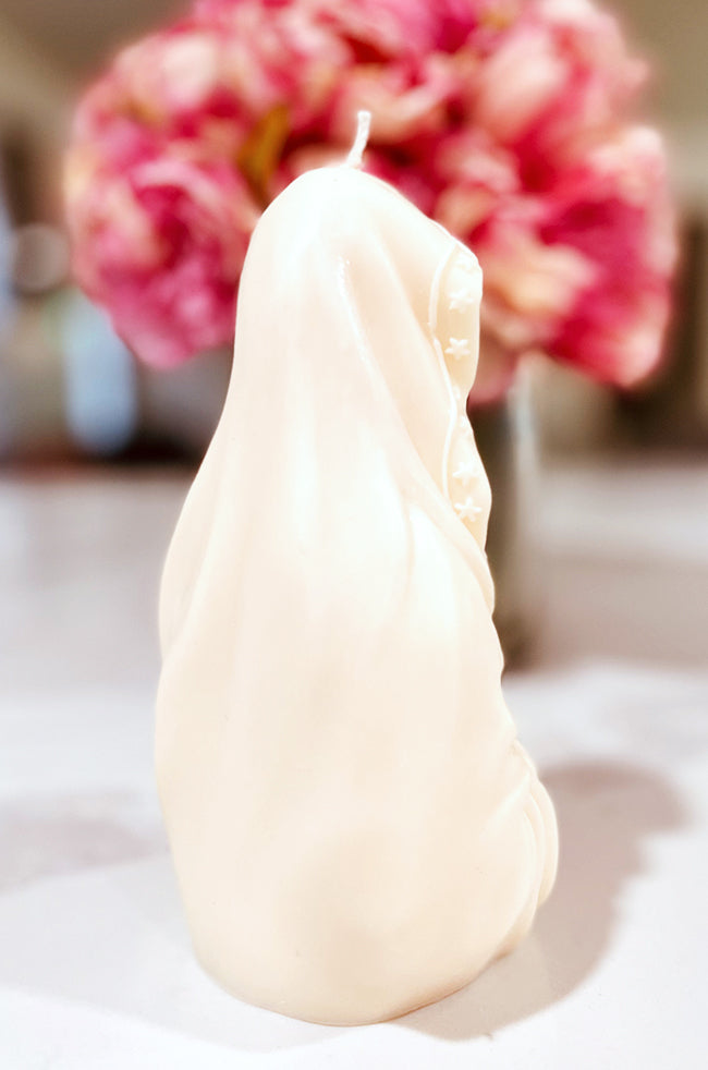 Madonna's Love Candle: Back view of the Madonna’s Love candle, showcasing its flowing, draped silhouette and smooth, handcrafted texture.