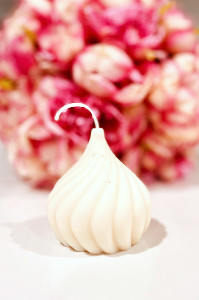 Teardrop Candle: Handmade Teardrop Candle with fluid sculptural form, designed to add calm, contemporary beauty to luxury home interiors.